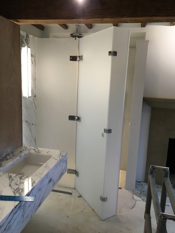Bespoke frosted glass shower enclosure in Bloomsbury luxury bathroom